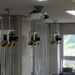 Projector and fixed cameras