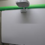 Projector and electronic whiteboard